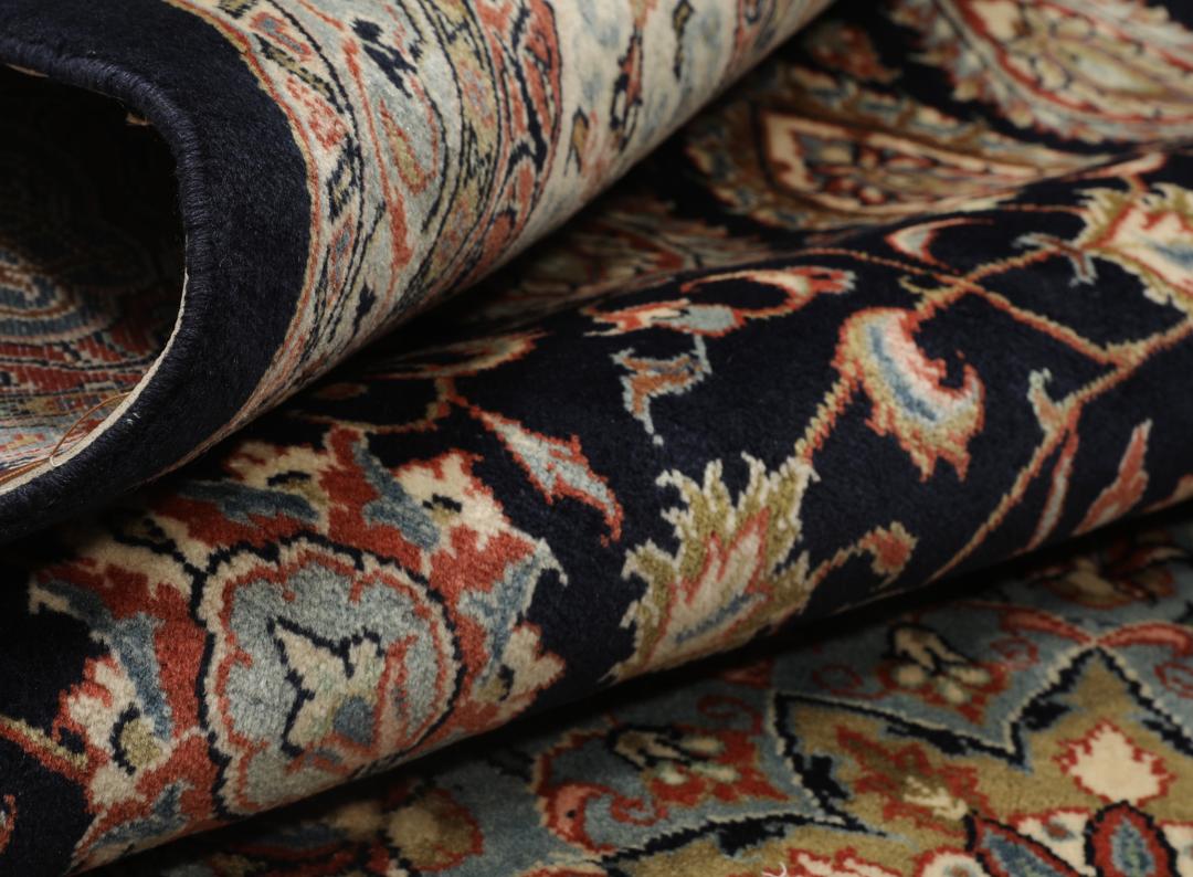 Hand-knotted Sarough rug with a central medallion and floral patterns in multicolor tones