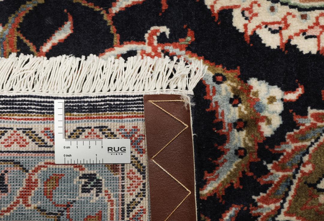 Hand-knotted Sarough rug with a central medallion and floral patterns in multicolor tones