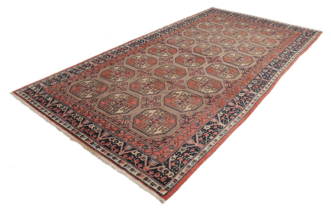 Tapis chinois Antique Khotan avec des motifs de médaillons géométriques marron et rouge foncé