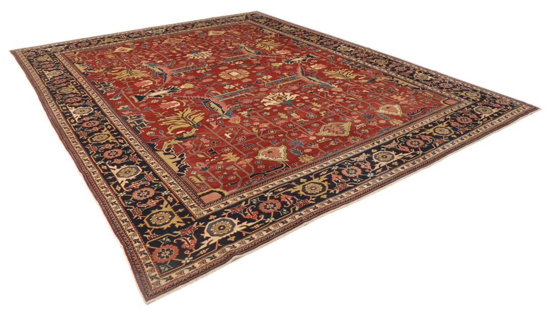Vintage håndknyttet tyrkisk Shirvan-tæppe i rødt med ornamenterede blomster- og geometriske mønstre.