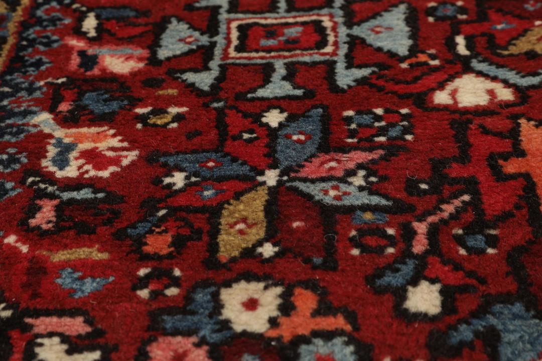 Håndlavet Heriz-løber i rød med geometriske motiver