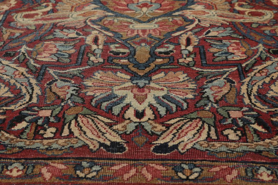 Handgeknoopt tapijt uit Persia in rood