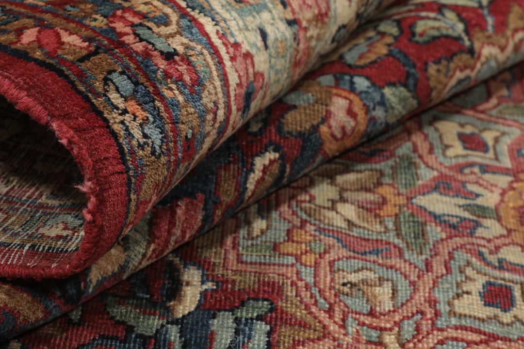 Handgeknoopt tapijt uit Persia in rood