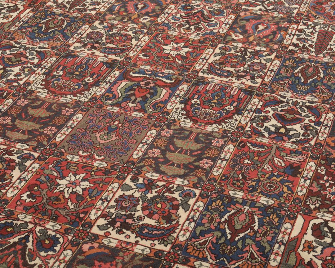 Hand-knotted Bakhtiar rug from the Middle East in deep red and multi-tonal shades
