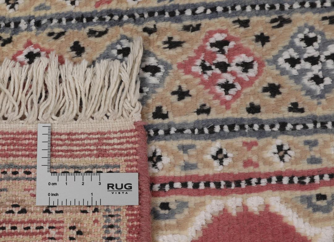 Hand-knotted Pakistan Bokhara 2ply rug with a dark-red field and geometric patterns