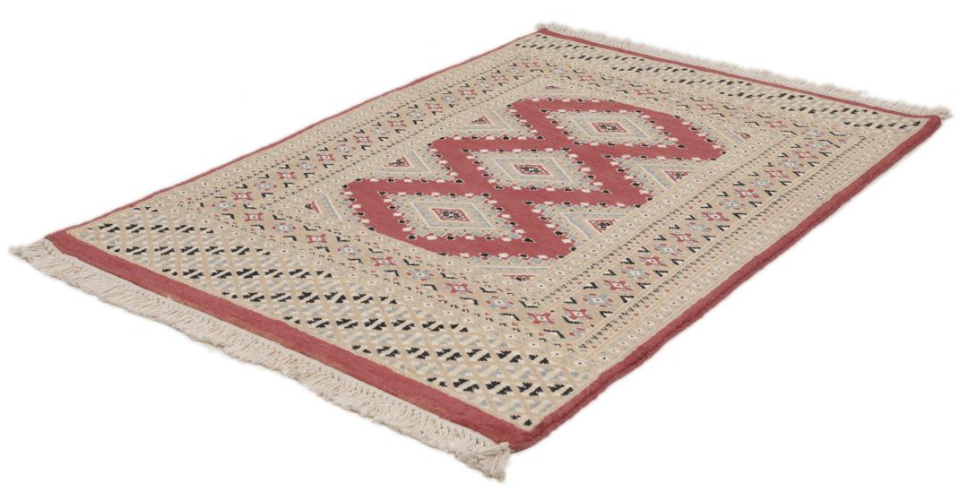 A hand-knotted red Pakistan Bokhara 2ply rug with geometric diamond motifs.
