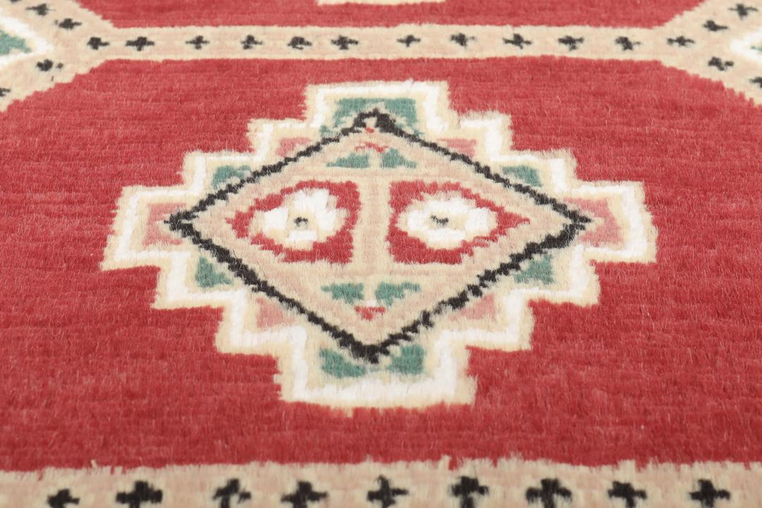 Hand-knotted Pakistan Bokhara 2ply rug with a rich red and beige colour palette
