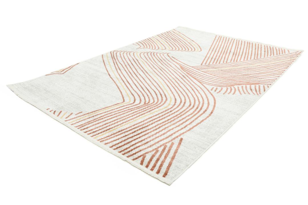 roestbruin vloerkleed met geometrisch patroon en franjes