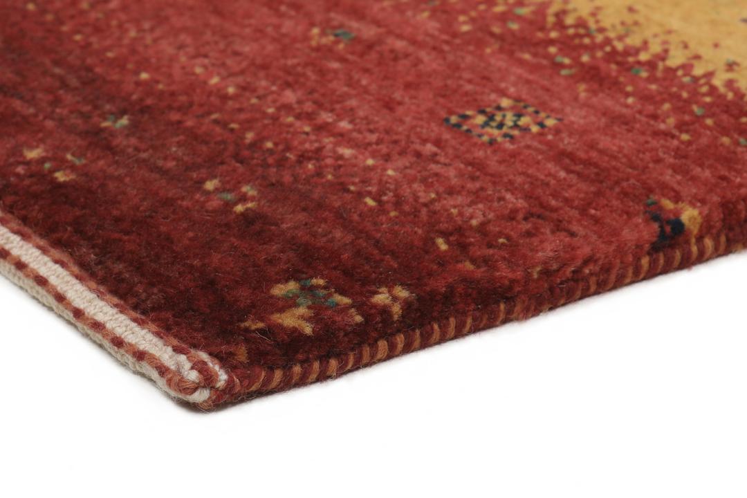Un tapis Loribaft noué à la main provenant du Moyen-Orient avec un motif rayé rouge, orange et bleu.