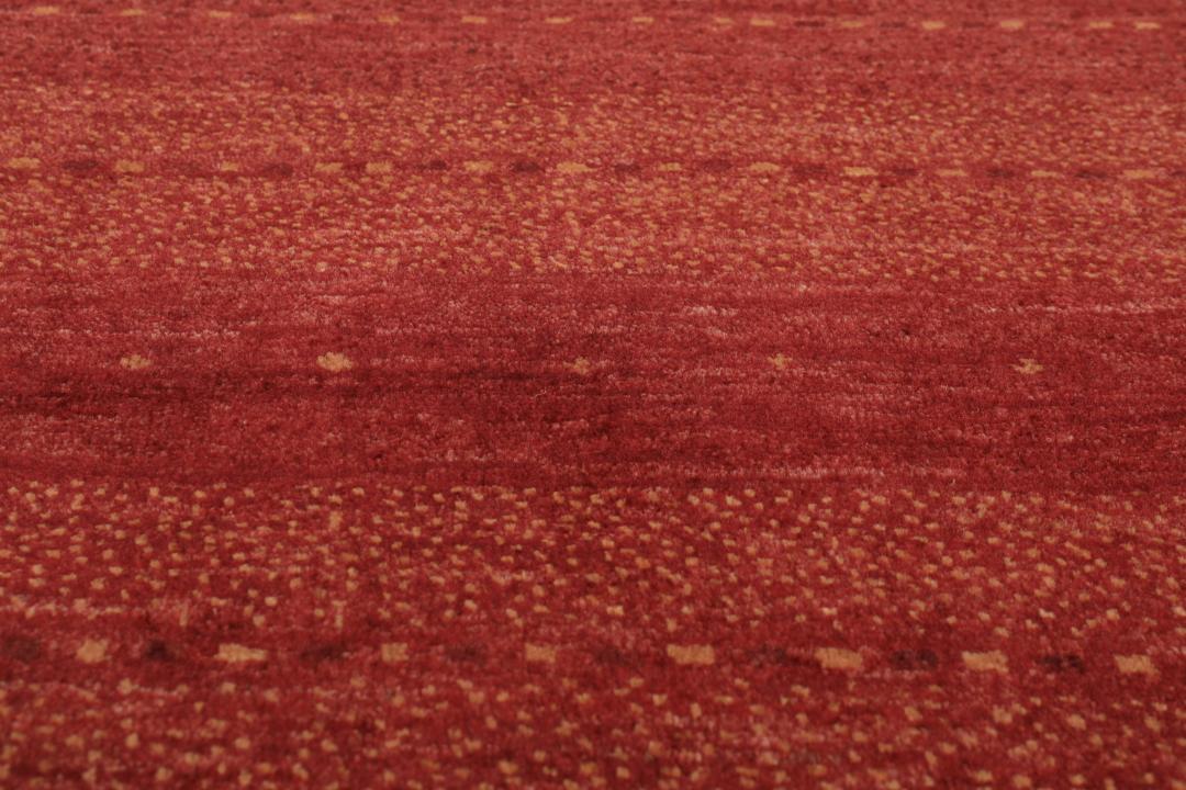 Handgeknoopt Loribaft-tapijt uit het Midden-Oosten in dieprode tinten