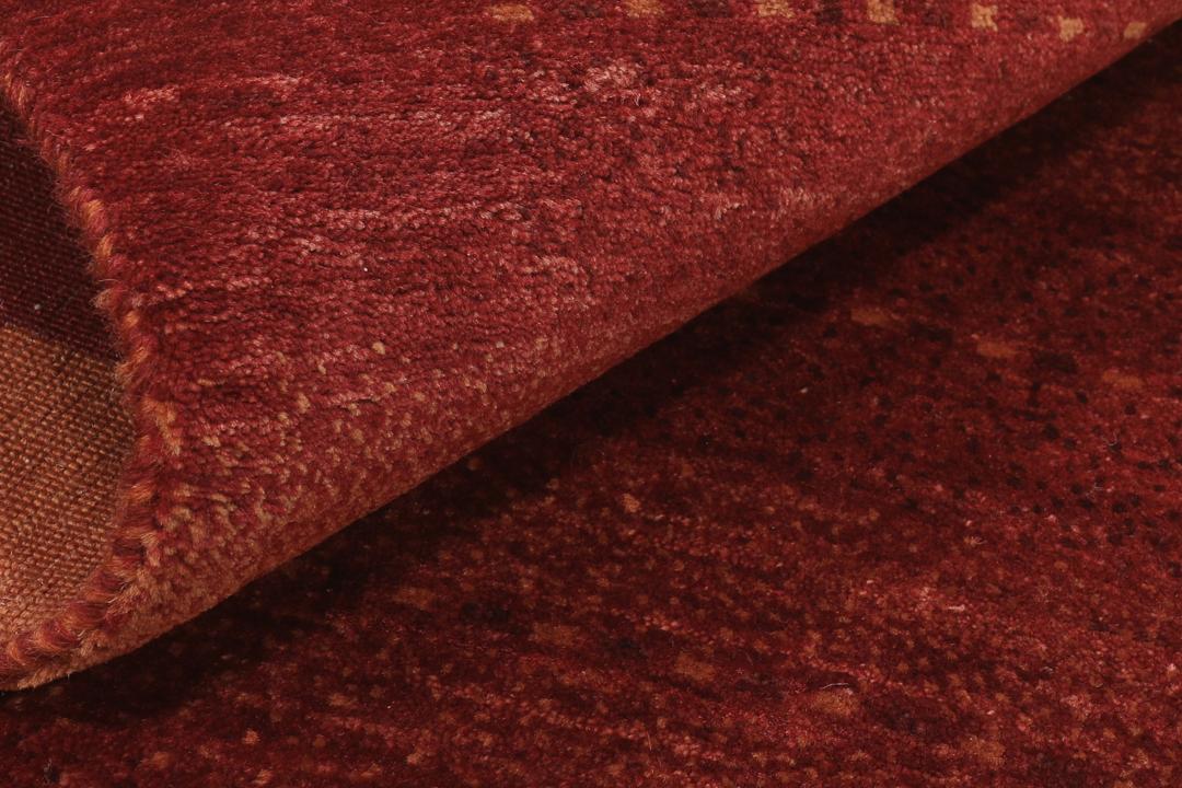 Handgeknoopt Loribaft-tapijt uit het Midden-Oosten in dieprode tinten