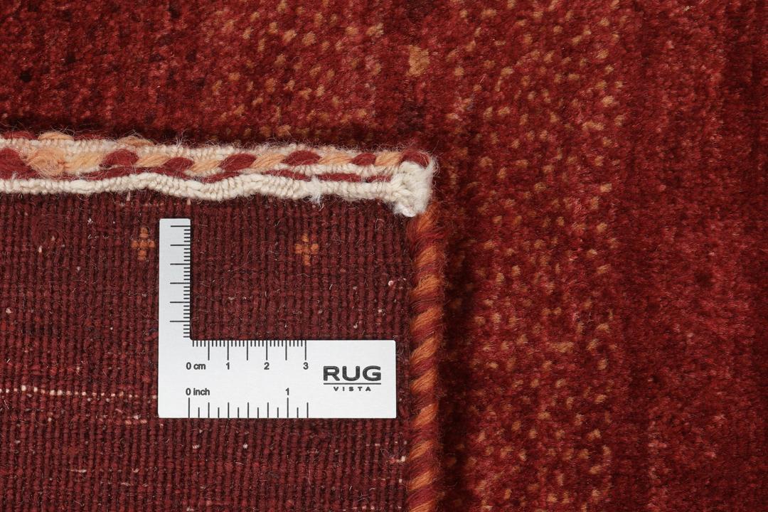 Handgeknoopt Loribaft-tapijt uit het Midden-Oosten in dieprode tinten