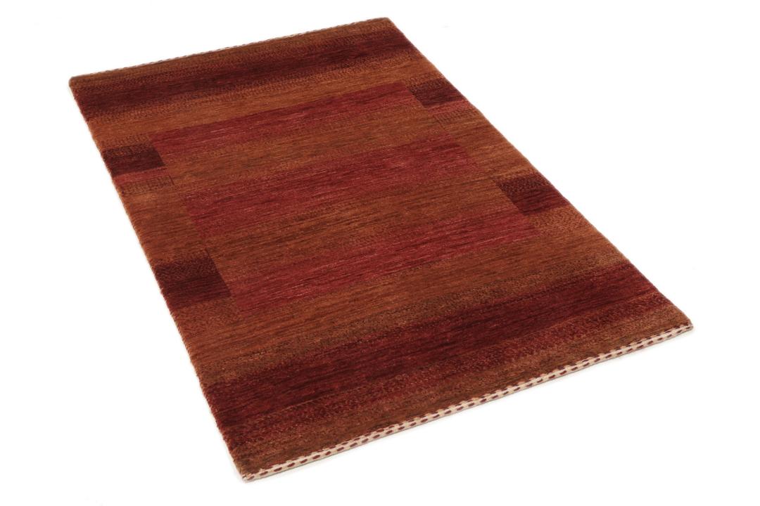 Handgeknoopt rood en bruin wollen kleed met een subtiel gestreept ontwerp