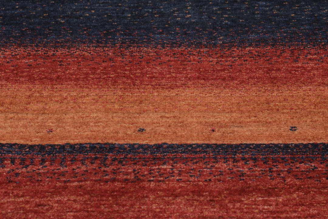 Hand-knotted Loribaft Fine wool rug from the Middle East in dark-red and black tones