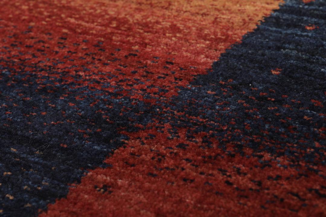 Hand-knotted Loribaft Fine wool rug from the Middle East in dark-red and black tones