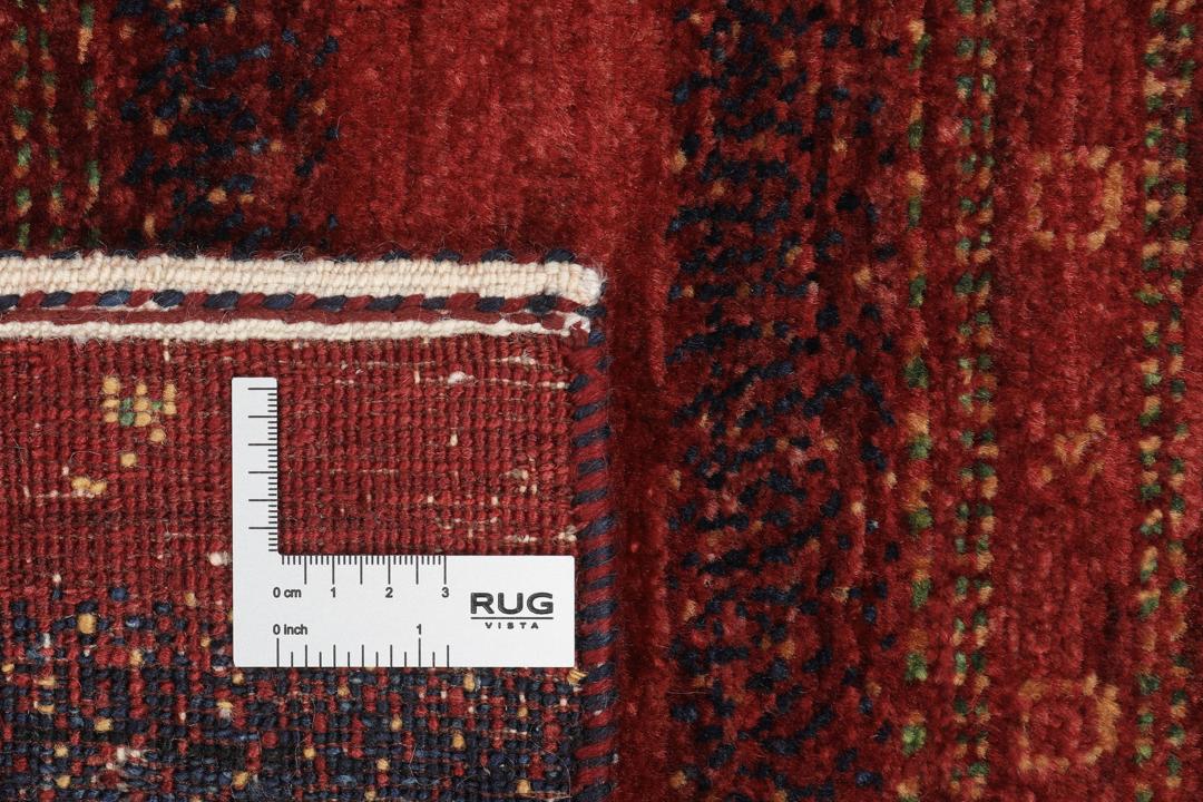 Hand-knotted Loribaft Fine rug from the Middle East in red and dark blue colours.