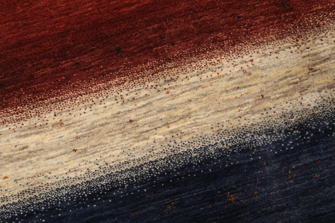 Hand-knotted Loribaft rug from the Middle East with a striped red, blue, and cream design
