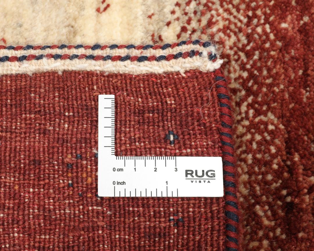 Hand-knotted Loribaft rug from the Middle East with a striped red, blue, and cream design