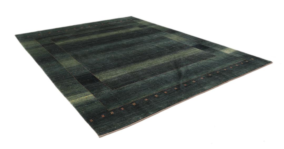 Hand-knotted Loribaft Fine rug from the Middle East in dark-green.