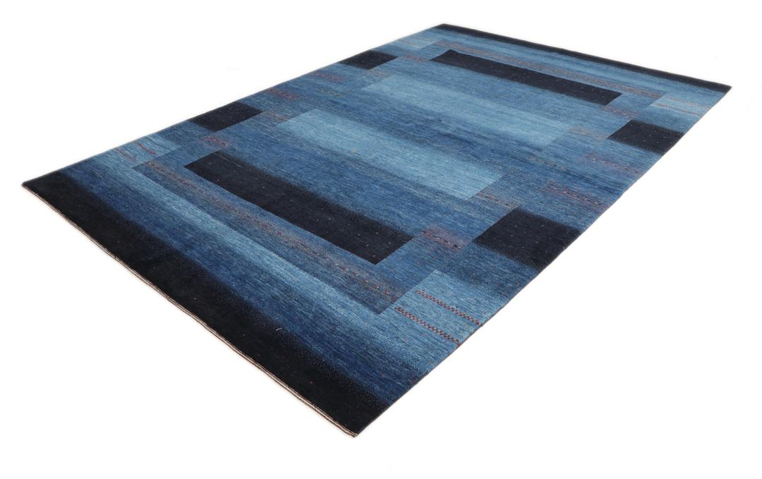 Hand-knotted Loribaft Fine rug from the Middle East in dark-blue and black tones