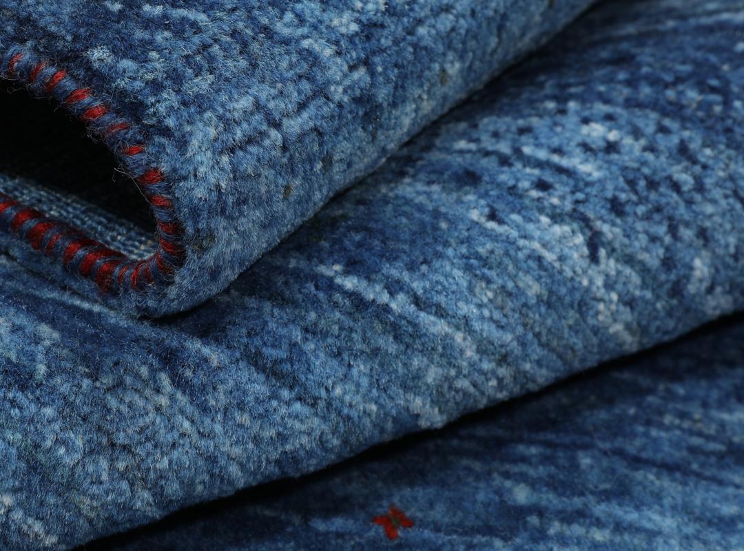Hand-knotted Loribaft Fine rug from the Middle East in dark-blue and black tones