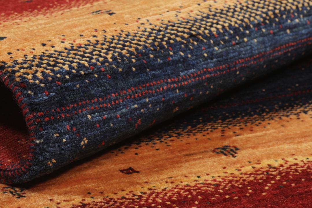 A hand-knotted Middle Eastern Loribaft rug featuring a striped pattern in red, blue, and beige wool.