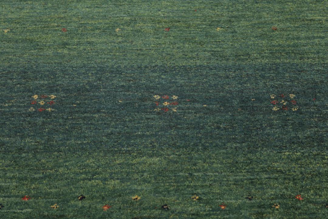 Håndknyttet Loribaft-tæppe fra Mellemøsten i dybe grønne toner