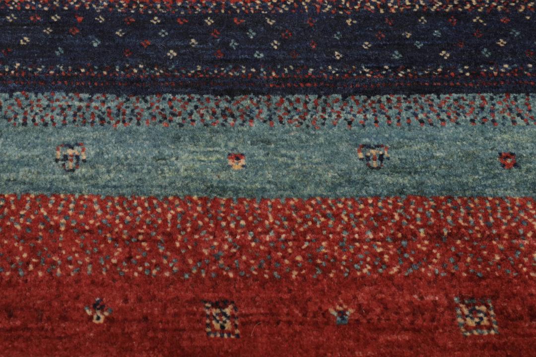 Hand-knotted Loribaft Fine rug with red, blue, and teal stripes from the Middle East