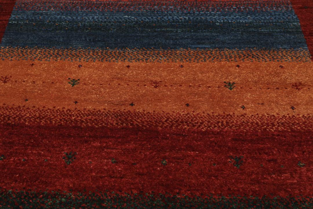 Hand-knotted Loribaft rug with a striped design in dark-red, blue, and orange from the Middle East.
