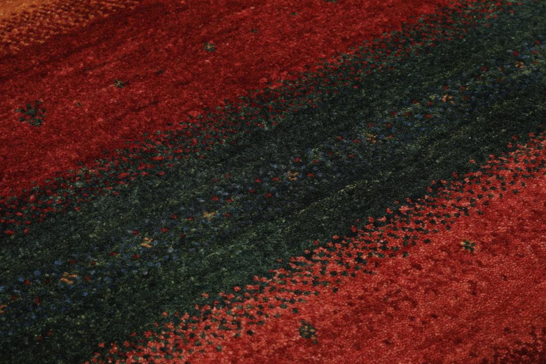 Hand-knotted Loribaft rug with a striped design in dark-red, blue, and orange from the Middle East.