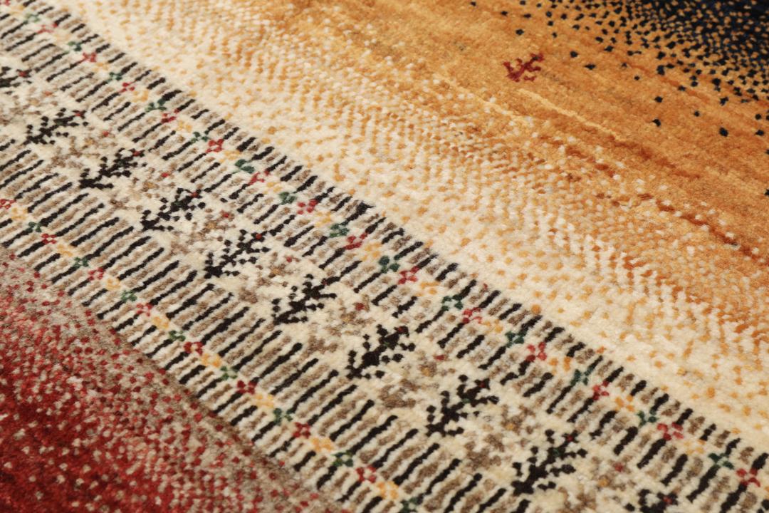 A hand-knotted Loribaft Fine rug from the Middle East featuring red, black, and beige stripes.