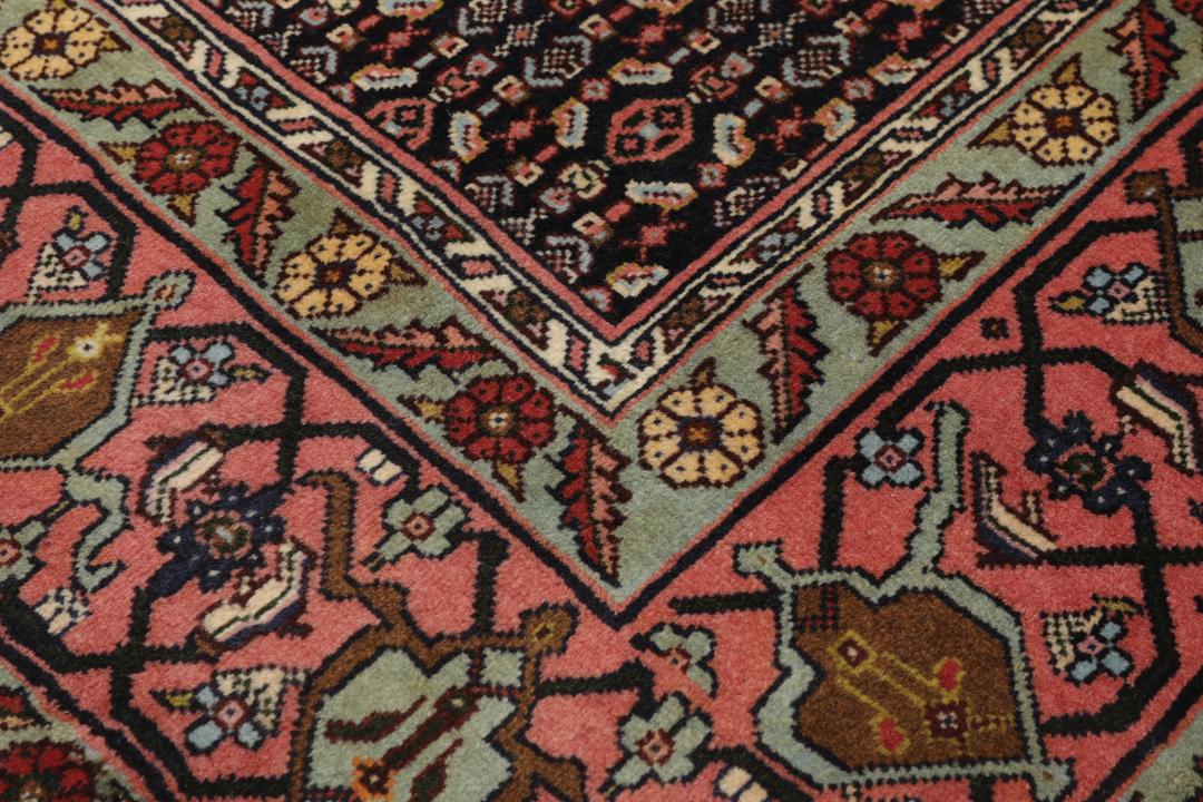 Hand-knotted Senneh rug from the Middle East with a multicolor geometric design