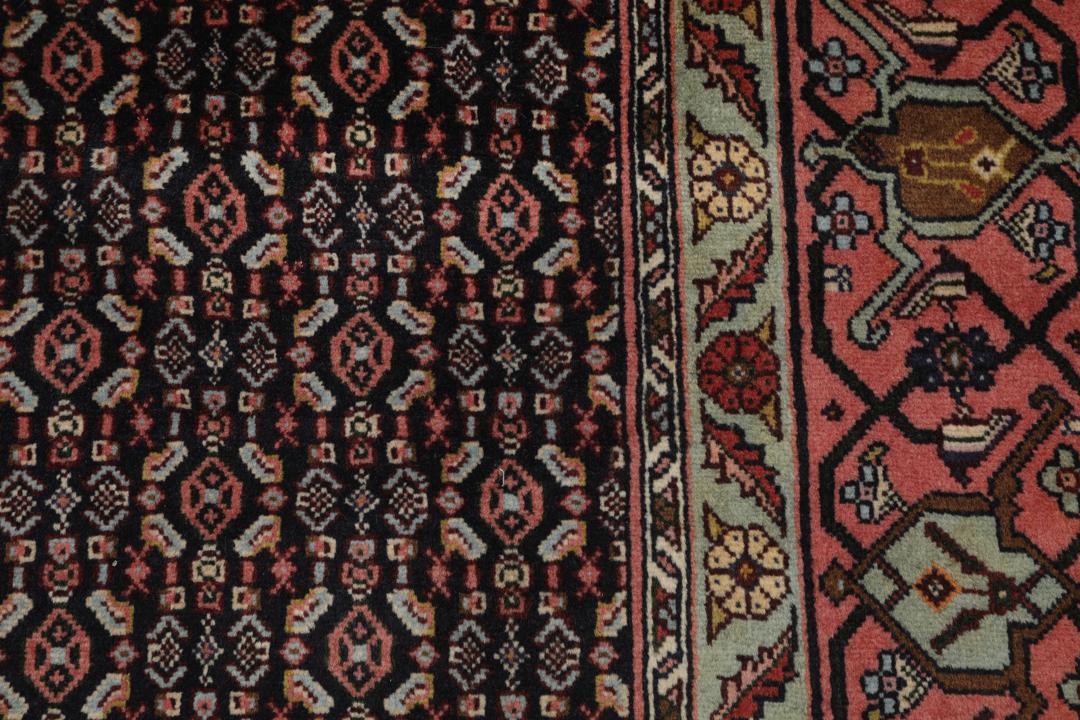 Hand-knotted Senneh rug from the Middle East with a multicolor geometric design