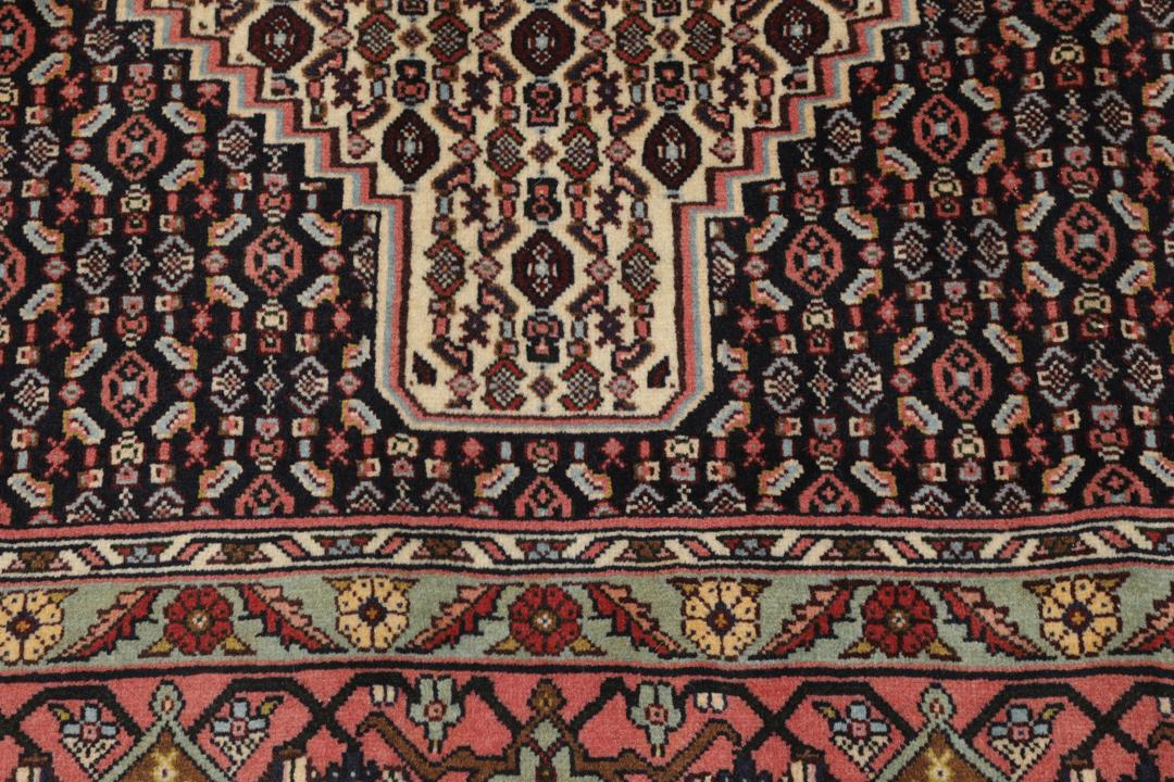 Hand-knotted Senneh rug from the Middle East with a multicolor geometric design