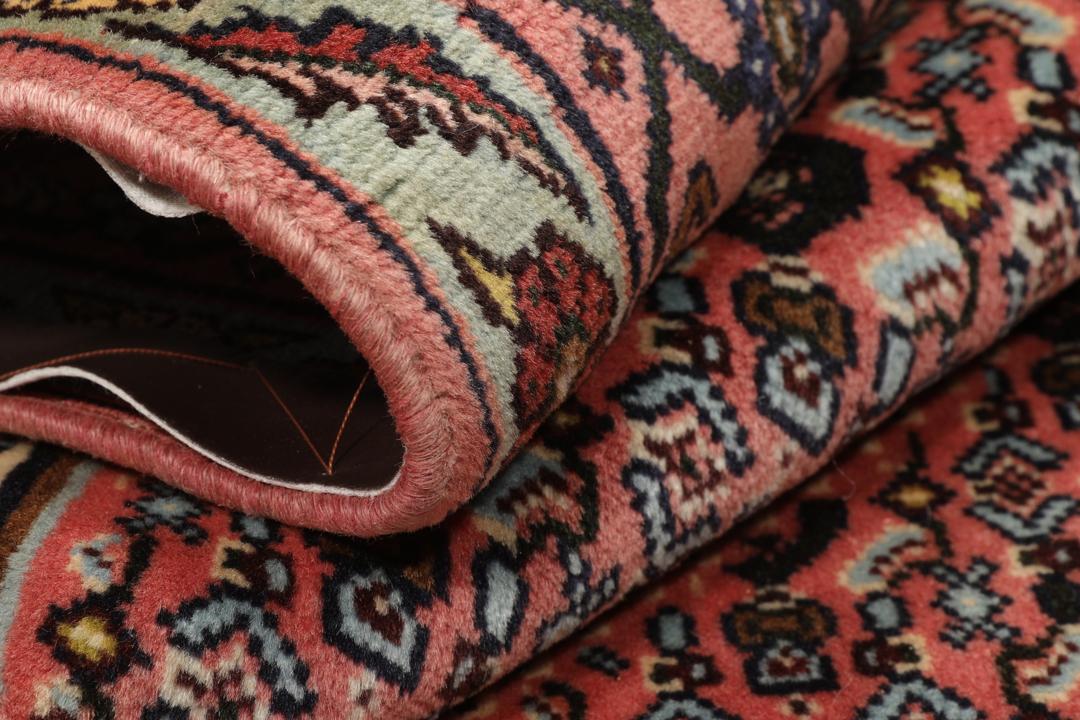 Hand-knotted Senneh rug from the Middle East with a multicolor geometric design