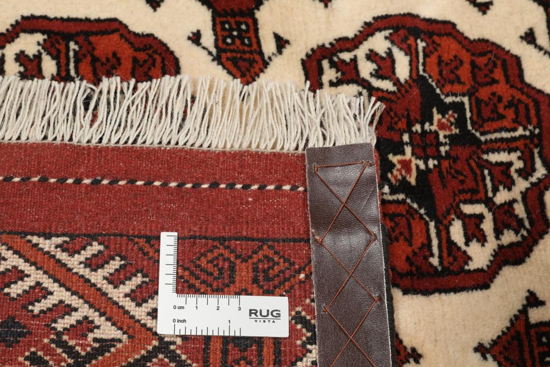 Håndknyttet Turkaman løber i mørkerød med traditionelle geometriske mønstre