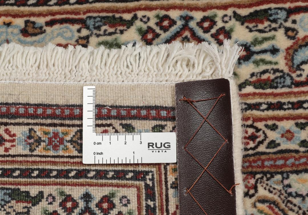 A hand-knotted Moud runner rug with a floral design in multicolor tones
