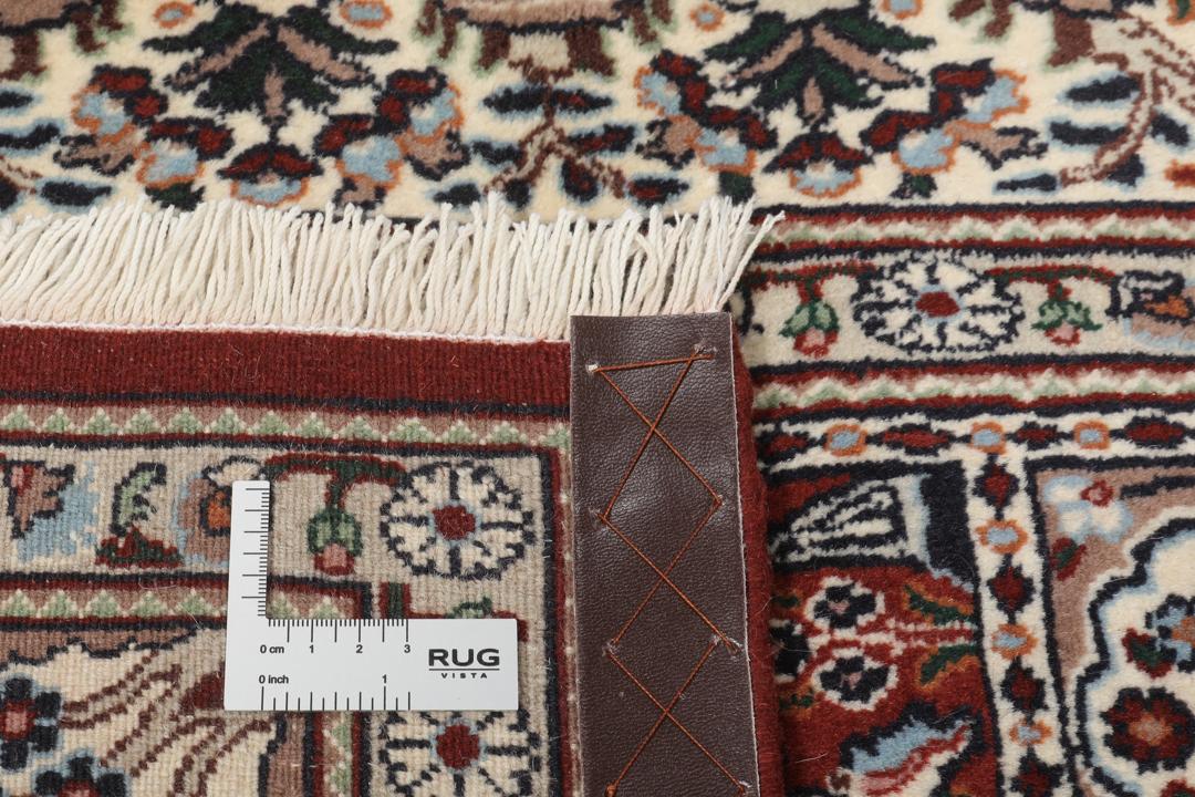 Handgeknoopt Moud-tapijt uit het Midden-Oosten in donkerrood met tuinmotieven
