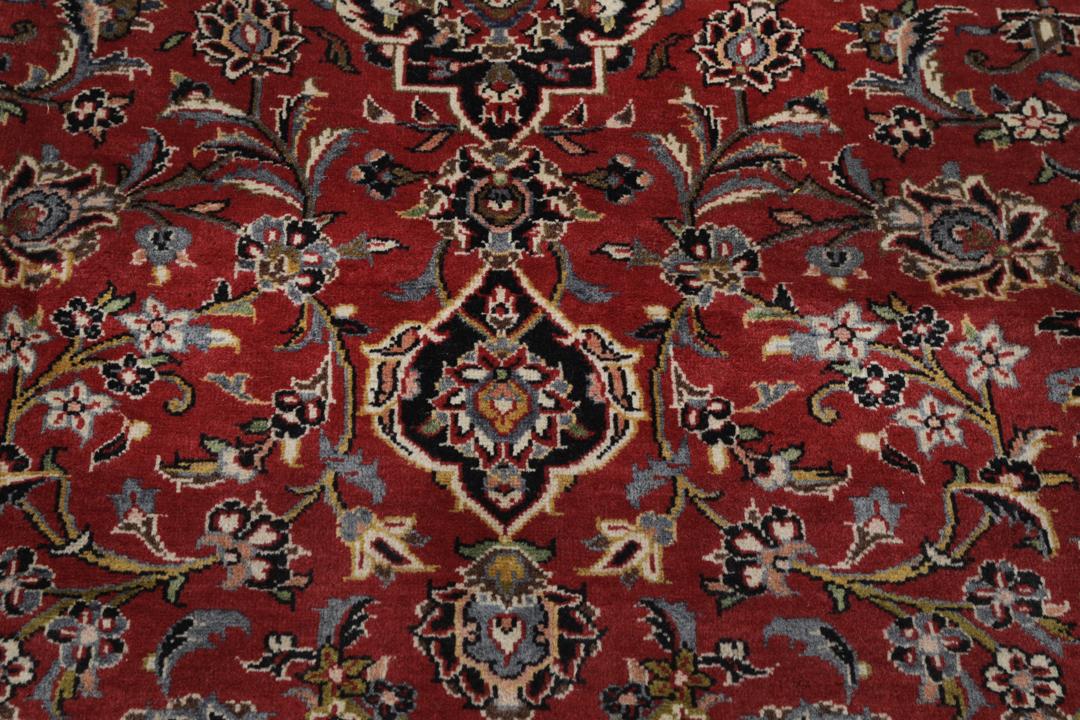 Hand-knotted Keshan rug from the Middle East in deep red and black