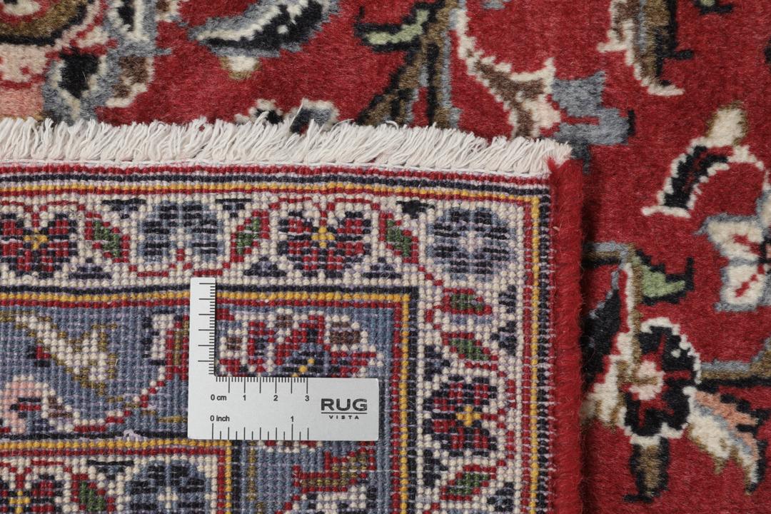 Hand-knotted Keshan rug from the Middle East in deep red and black