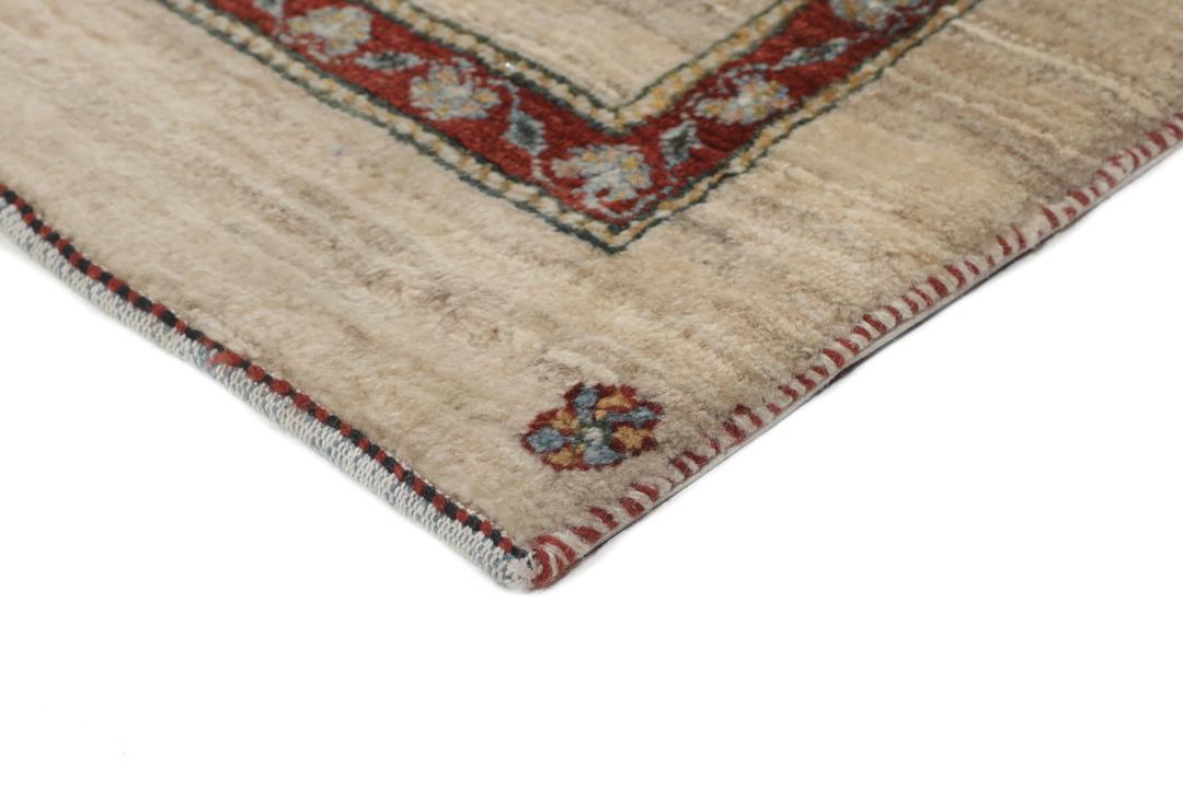 Handgeknoopt Gabbeh Kashkooli wollen vloerkleed met een zwart en beige bloemmotief uit het Midden-Oosten