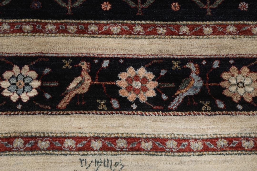 Handgeknoopt Gabbeh Kashkooli wollen vloerkleed met een zwart en beige bloemmotief uit het Midden-Oosten
