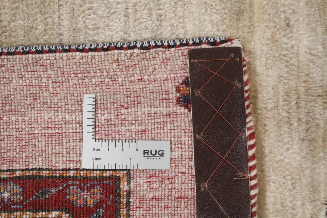 Handgeknoopt Gabbeh Kashkooli wollen vloerkleed met een zwart en beige bloemmotief uit het Midden-Oosten