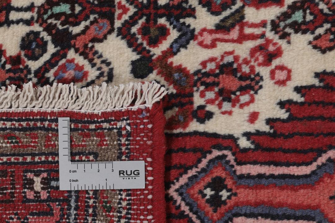 Met de hand geknoopte Asadabad loper uit het Midden-Oosten in rood en crème