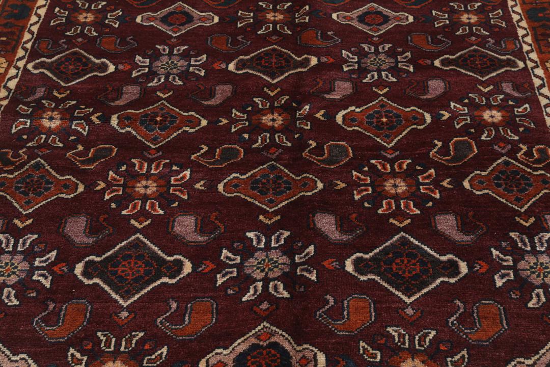 Handgeknoopt Lori tapijt uit het Midden-Oosten in donkerrood met geometrische motieven