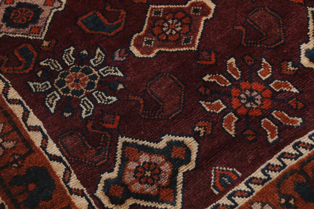 Handgeknoopt Lori tapijt uit het Midden-Oosten in donkerrood met geometrische motieven