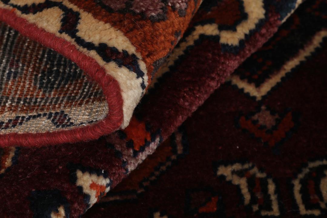 Handgeknoopt Lori tapijt uit het Midden-Oosten in donkerrood met geometrische motieven