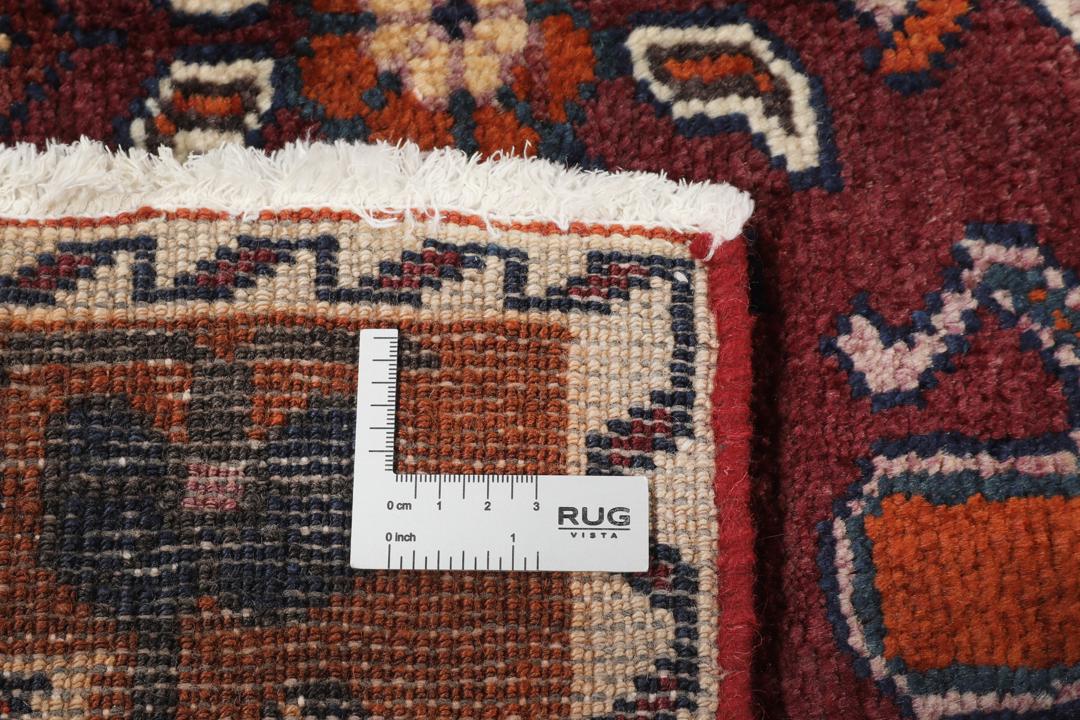 Handgeknoopt Lori tapijt uit het Midden-Oosten in donkerrood met geometrische motieven