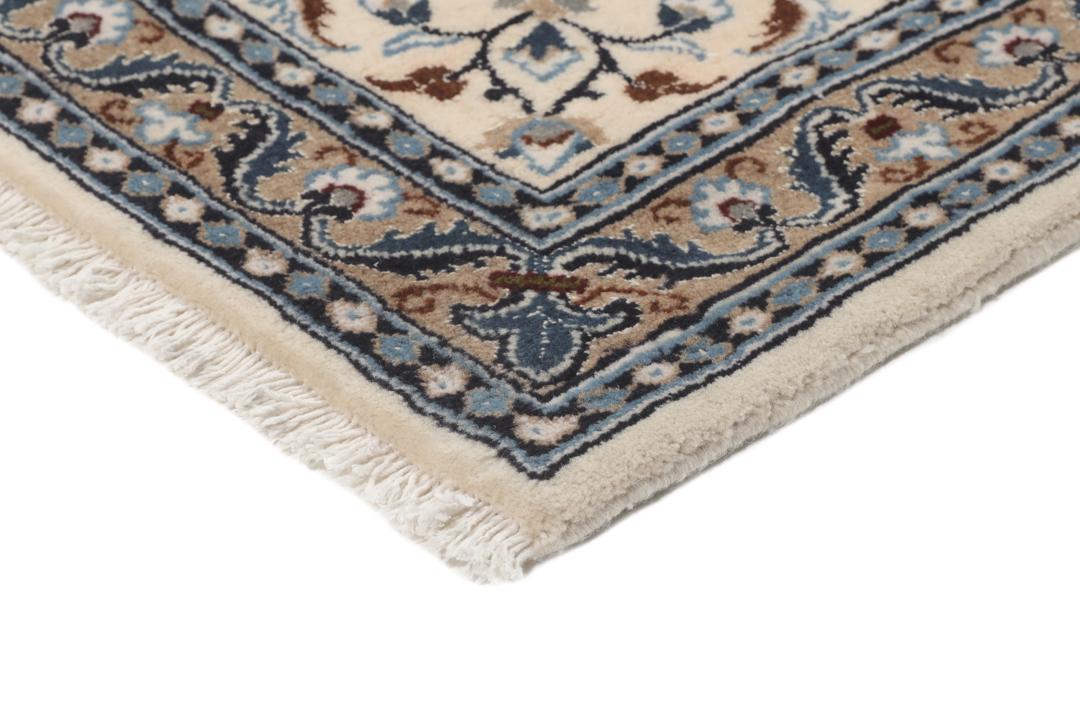 Authentic hand-knotted Nain rug from the Middle East in beige and blue tones