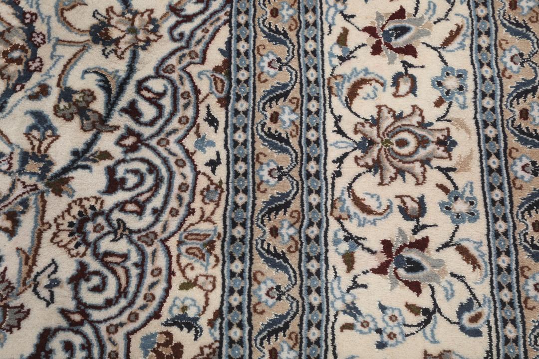 Authentic hand-knotted Nain rug from the Middle East in beige and blue tones